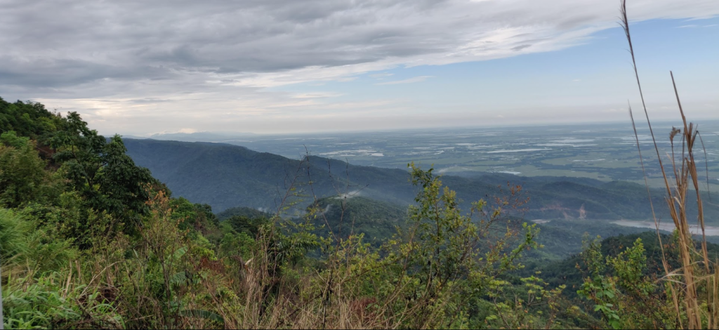 Hilltop view over green valleys and plains in Northeast India