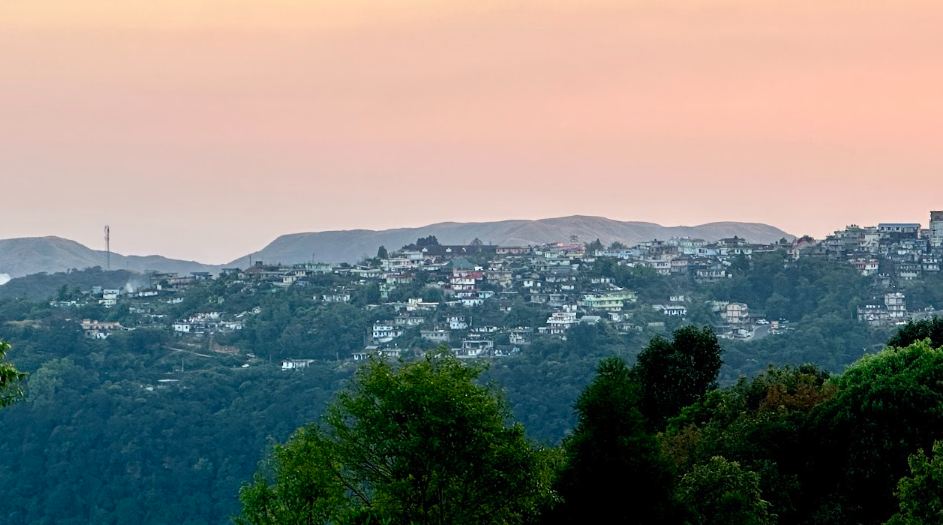 Shillong town spread across the hills at dusk