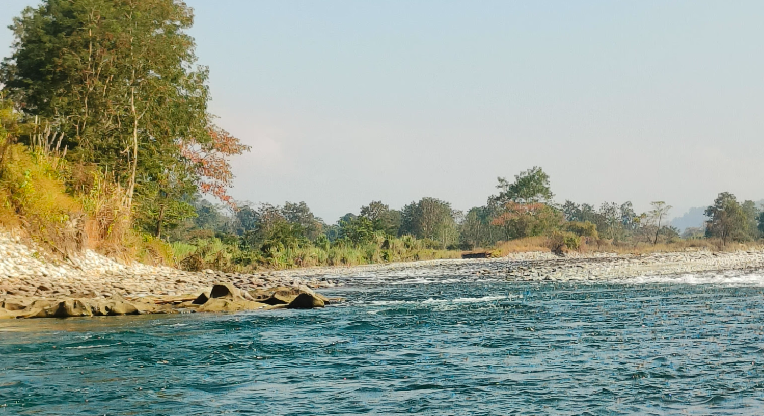 Clear river flowing past a rocky bank in eastern Arunachal Pradesh